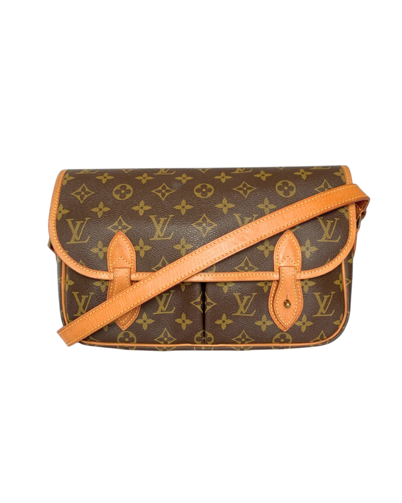 Louis Vuitton Satchel Messenger in Monogram Canvas, front flat view with twin tan leather strap closures
