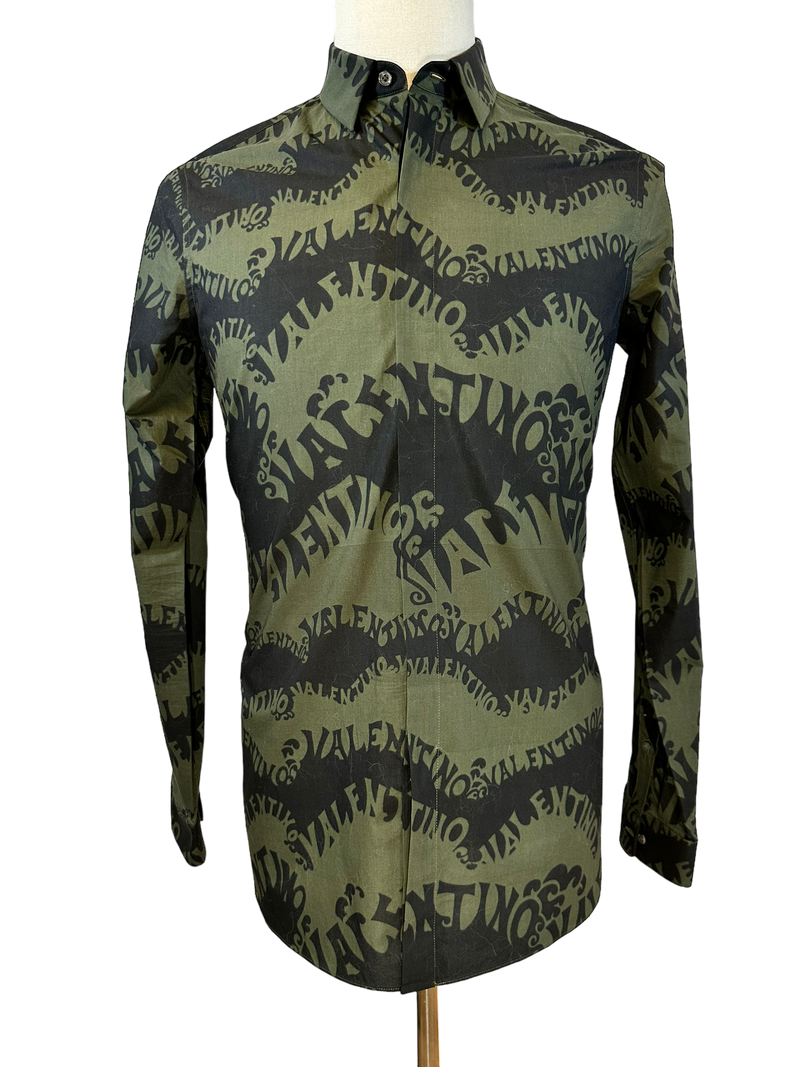 Valentino wave print longsleeve shirt in olive and black, front view on form with all-over wavy logo print