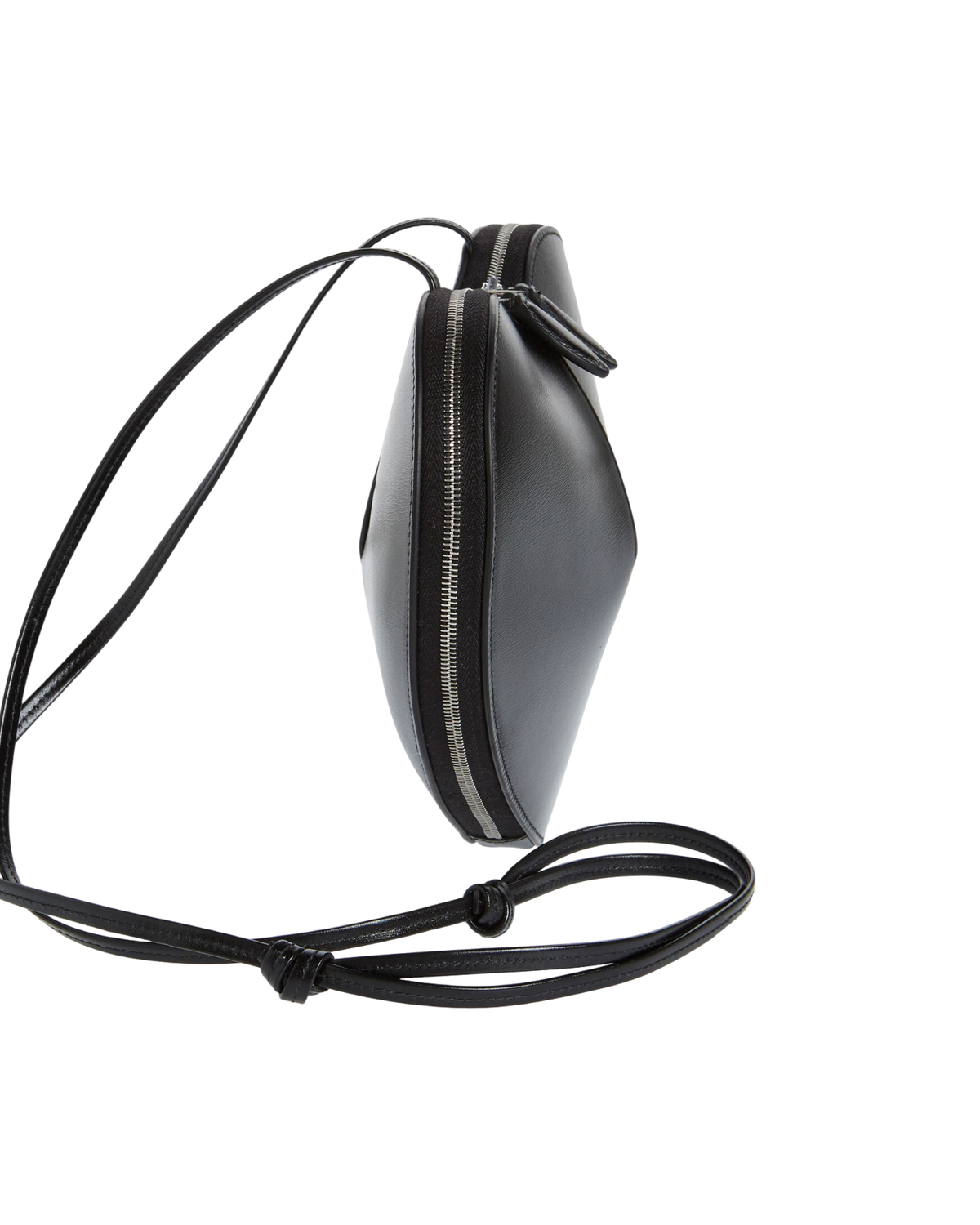 Alaïa Le Coeur leather shoulder bag in black, side view showing the slim profile and wraparound silver zipper