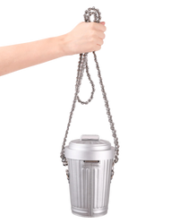 Moschino Trash Can chain shoulder bag in grey held up by its doubled silver chain strap to show full strap length