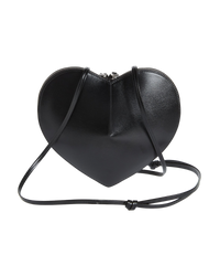 Alaïa Le Coeur leather shoulder bag in black, angled front view with zip top and thin knotted shoulder strap
