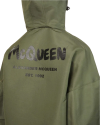 Alexander McQueen Graffiti logo nylon windbreaker in army green, detail close-up of the black graffiti logo on back
