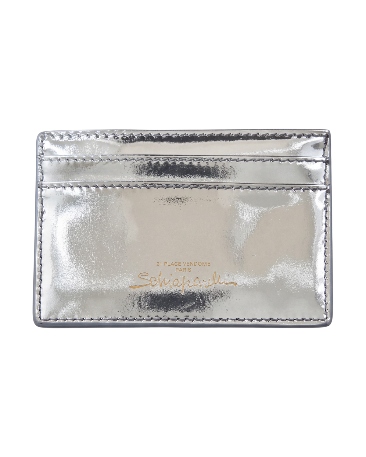 Schiaparelli Keyhole card holder in silver, back view of the metallic leather with gold Schiaparelli script and address stamp