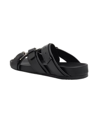 Loewe Type Fussbett sandal in black, rear three-quarter view of the open back, buckled straps and thick footbed