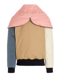 JW Anderson colorblock bomber jacket in multicolor, back view with the pink embossed logo hood worn as a collar