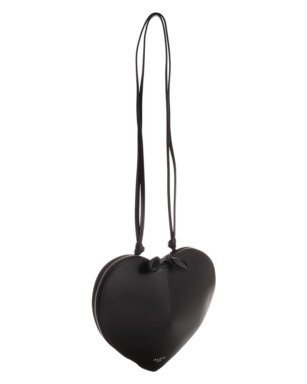 Alaïa Le Coeur leather shoulder bag in black hanging by its strap, showing the knotted leather tie at the top
