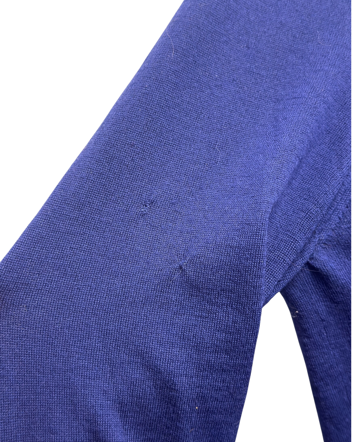 Prada fine-gauge knit crewneck sweater in cobalt, detail close-up of the knit texture along the sleeve