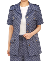 Gucci Interlocking GG canvas dress jacket in blue on model, front view with notch collar and four patch pockets