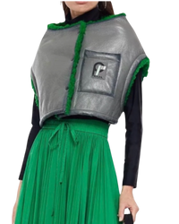 Prada cropped leather shearling vest in grey and green on model, front view with snap front and logo patch pocket