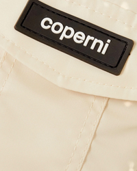 Coperni Cut-Out Cropped Twill Bomber Jacket in Cream