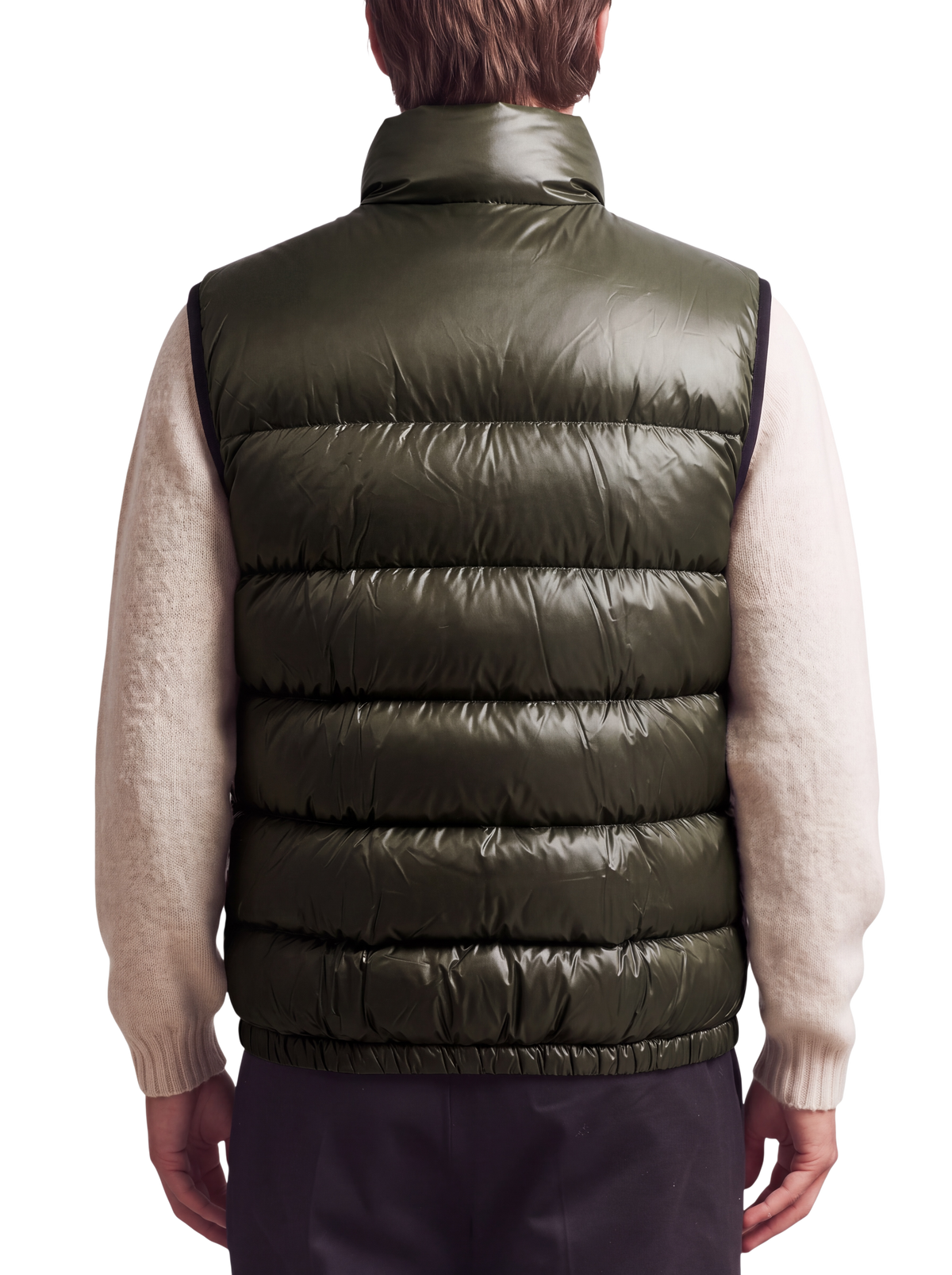 Prada quilted ripstop down gilet in green, back view on model showing horizontal down channels and elasticated hem