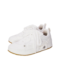 Loewe Deconstructed sneakers in soft white denim, side view of the pair with frayed laces and gum soles