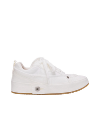 Loewe Deconstructed sneaker in soft white denim, side view with frayed denim laces, metal rivet and gum rubber sole