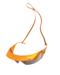 Dior Golf shield sunglasses in orange, top view of the Dior logo visor with the orange cord looped above