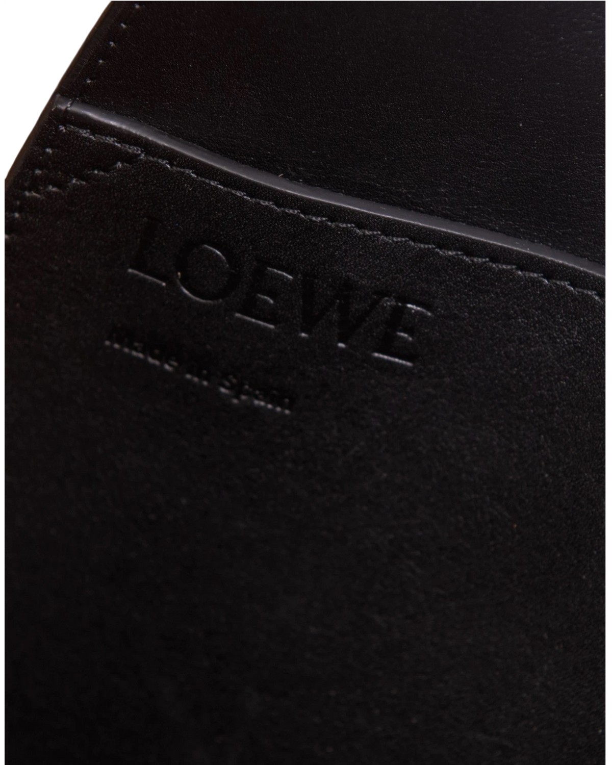 Embossed LOEWE and Made in Spain stamp on the interior leather of the Paseo tote