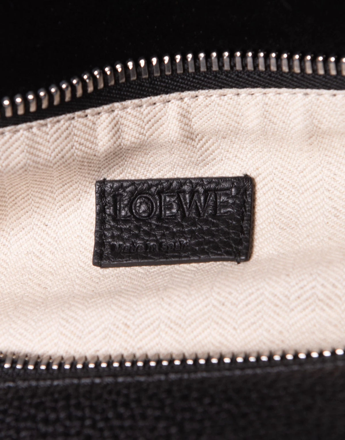 Loewe Puzzle Bag — Black Grainy Leather, interior LOEWE Made in Spain tag