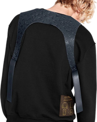 Louis Vuitton Cut Away Vest worn, back view, showing the monogram embossed yoke across the shoulders