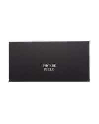 Phoebe Philo black rectangular branded eyewear storage box with silver logo lettering