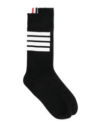 Thom Browne 4-Bar sock in black, mid-calf, with four white bars on the calf and a tricolour grosgrain tab at the cuff