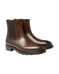 Front three-quarter view of the Tom Ford Stuart Chelsea boots in polished brown calf