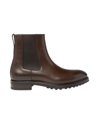 Side profile of a single Tom Ford Stuart Chelsea boot, showing the pull tab, gusset and lugged rubber sole